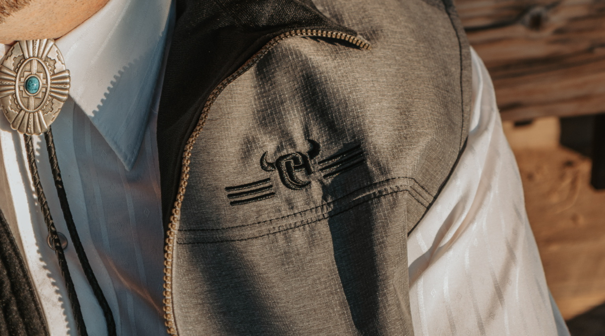 Cowboy wearing a men's Cowboy Hardware outerwear jacket.