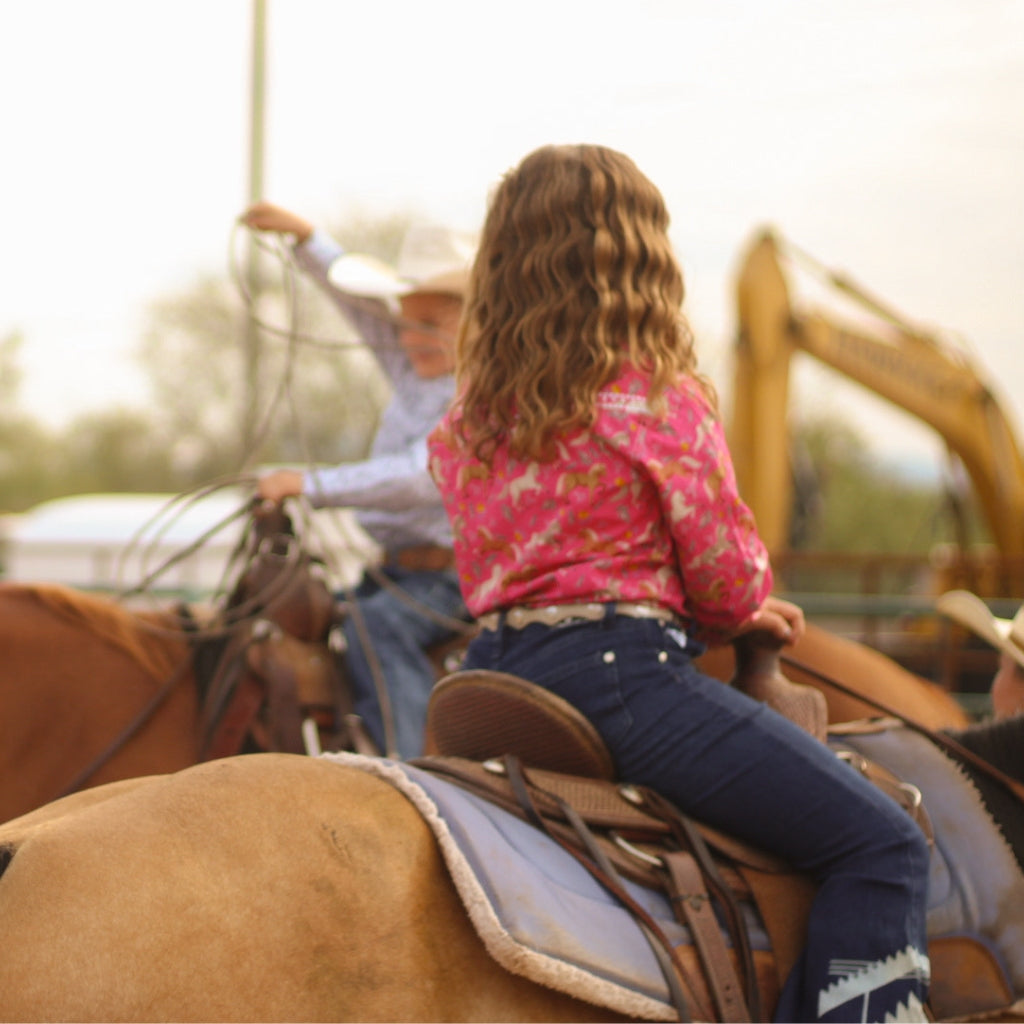 little cowgirl wearing girl's western wear from Cowgirl Hardware