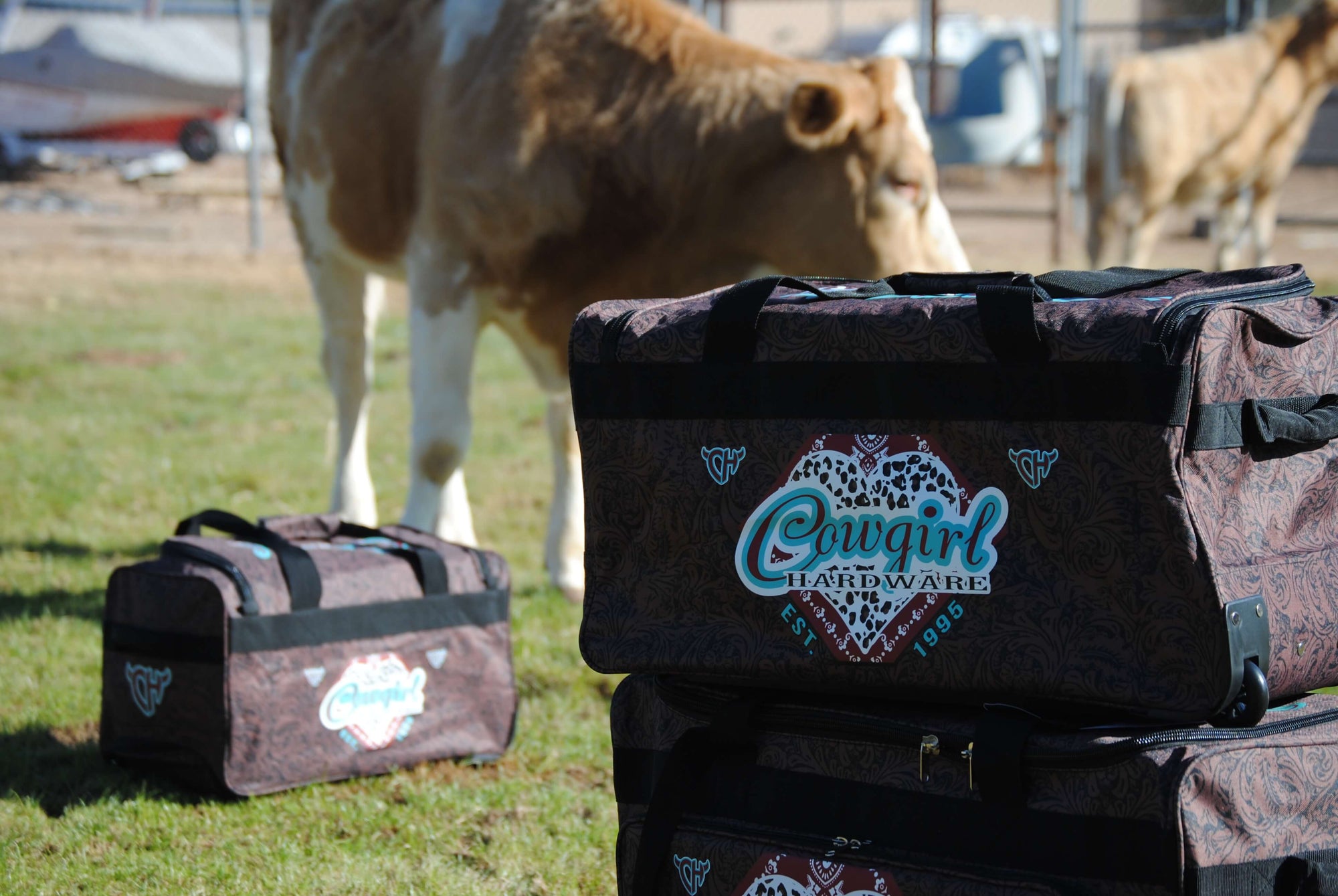 All Three Sizes of Our CH Fancy Heart Tooled Leather 3 Wheel Gear Bags from Cowgirl Hardware