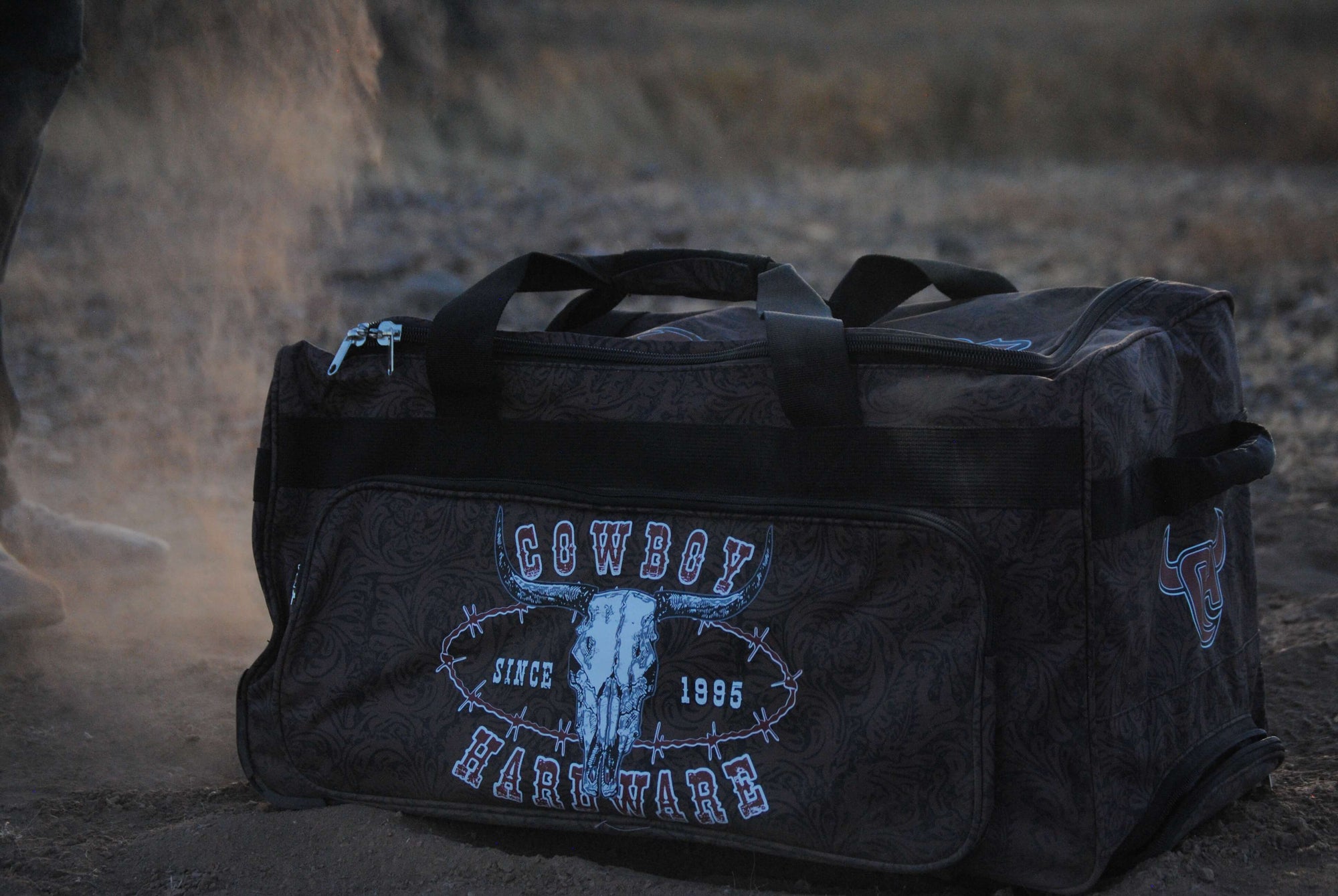 CH Outlaw Since 95' 3 Wheel Gear Bag in Dirt with Dust from Cowboy Hardware