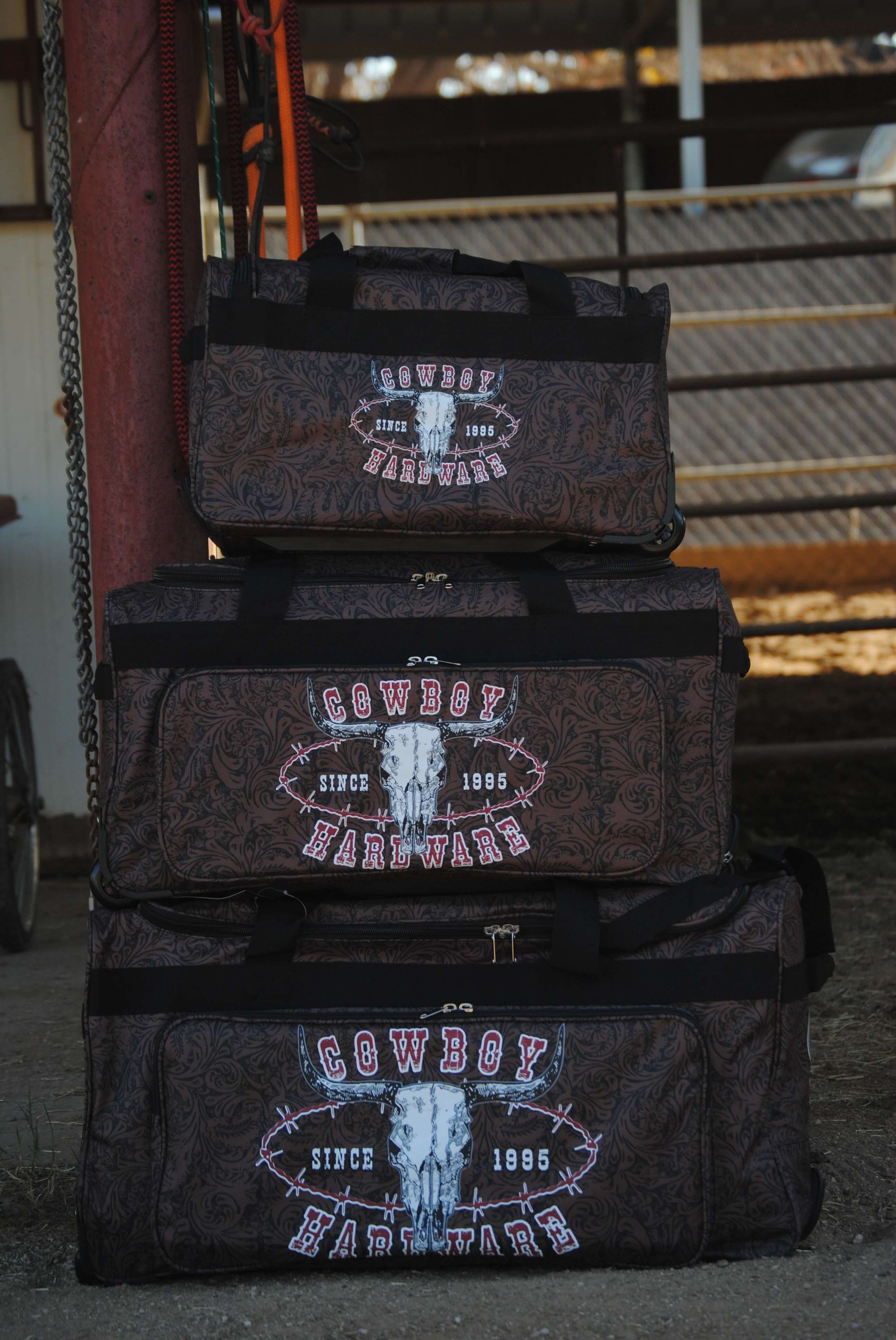 All Three Sizes of Our CH Outlaw Since 95' 3 Wheel Gear Bags Stacked from Cowboy Hardware