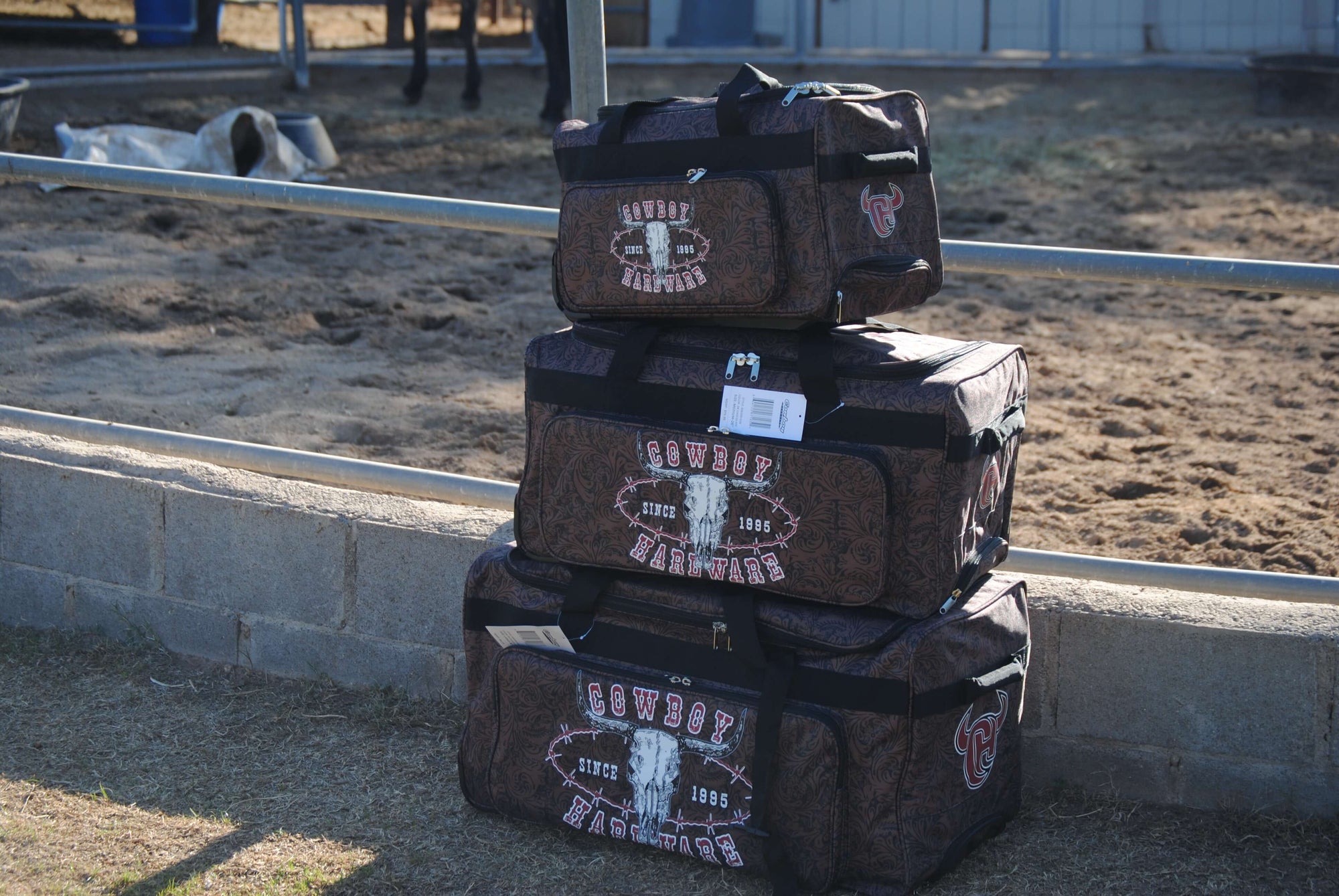 All Three Sizes of Our CH Outlaw Since 95' 3 Wheel Gear Bags Stacked from Cowboy Hardware