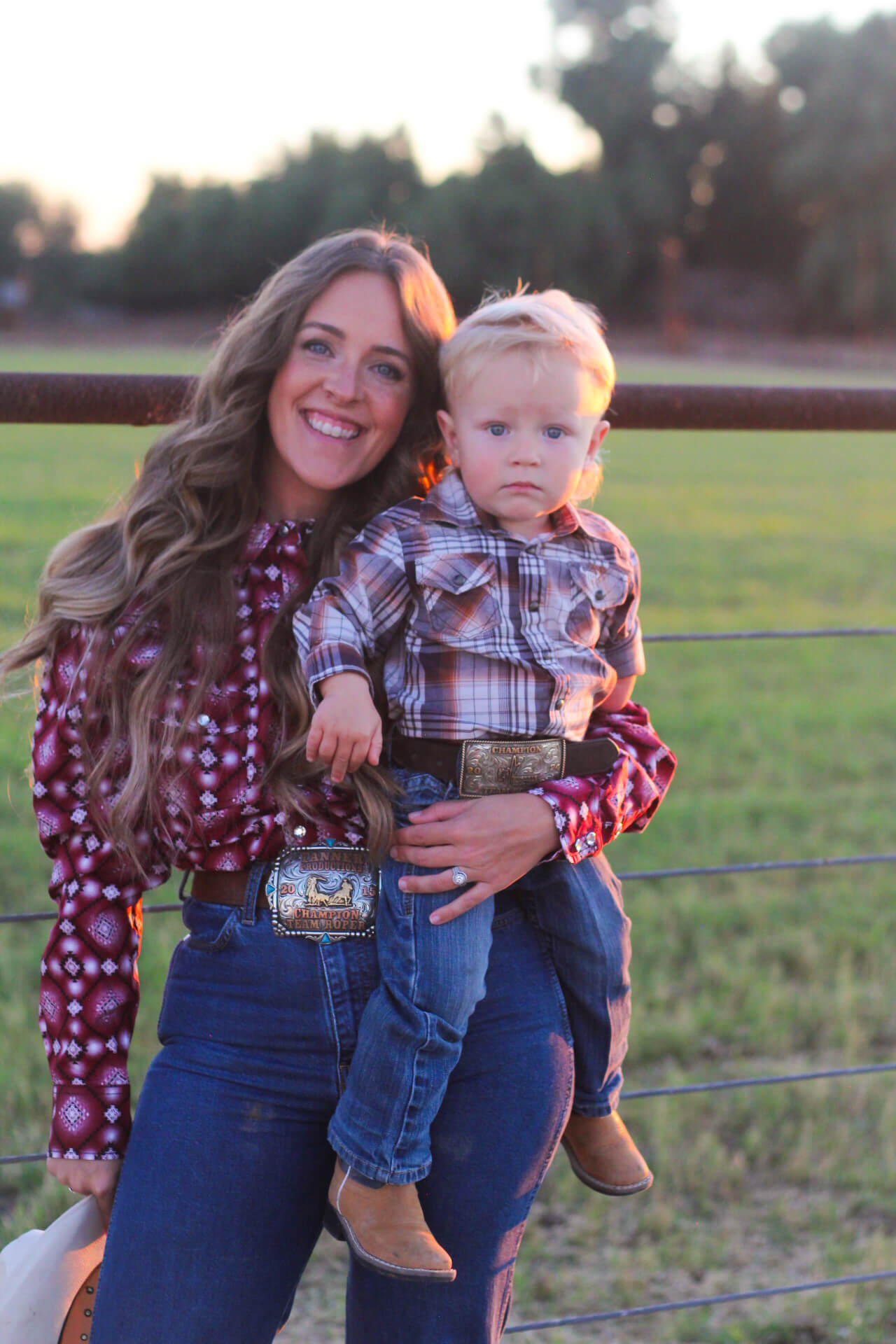 Mother with her young cowboy on the ranch.