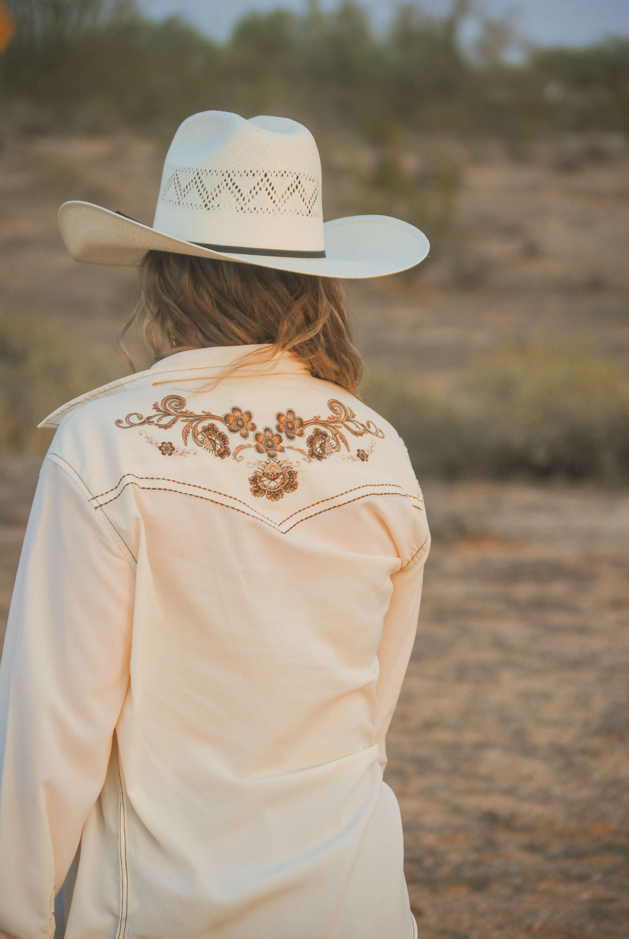 Back view of Women's Cowgirl Hardware Vintage Off-White Embroidered Long Sleeve Solid Western Shirt