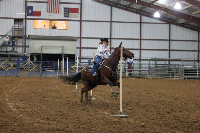 Cowgirl barrel racing