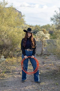 Cowgirl ready to rope some cattle.