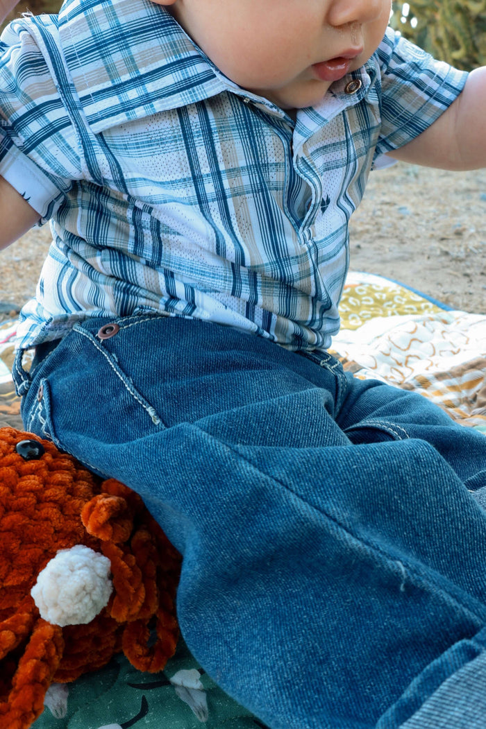 Little cowboy wearing Cowboy Hardware' infant and toddler boys CH white hermosillo jacquard short sleeve polo shirt - lifestyle